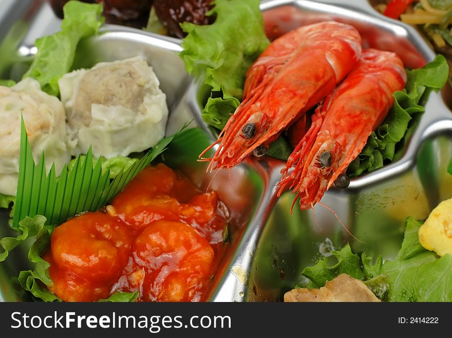 Detail of some shrimps on a seafood assortments tray. Detail of some shrimps on a seafood assortments tray.