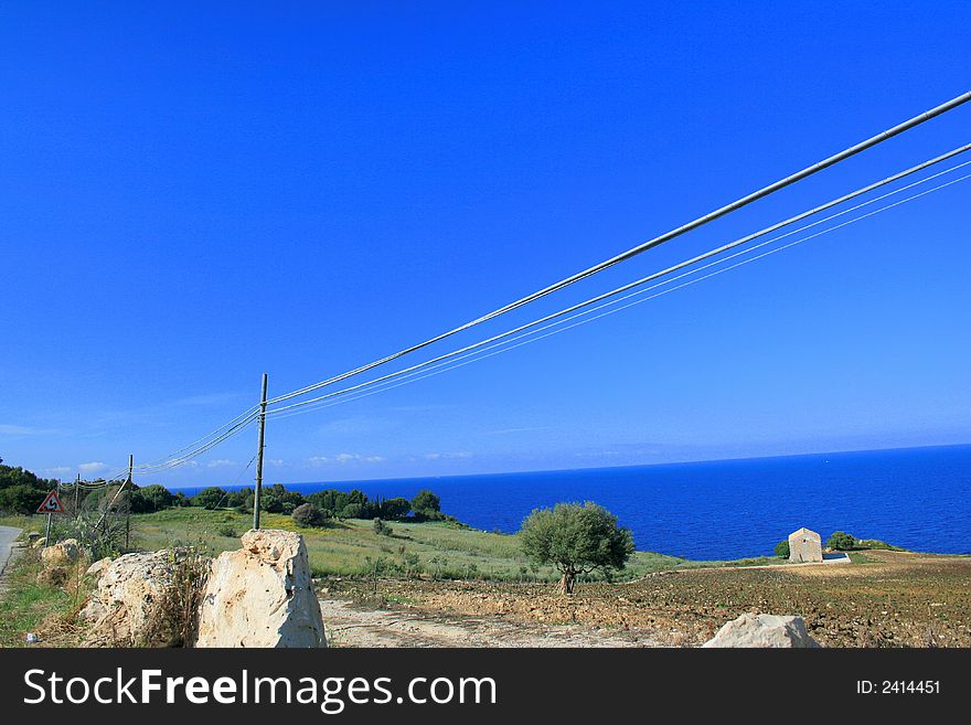 Landscape. One House on Blue. Mediterraneo. Orizont. Season summer. Sicily. Italy. Landscape. One House on Blue. Mediterraneo. Orizont. Season summer. Sicily. Italy