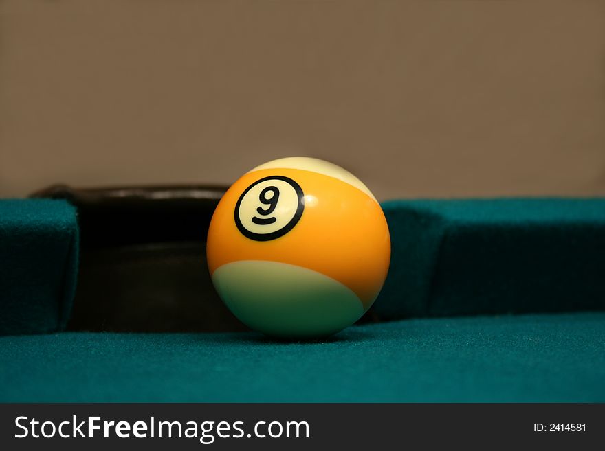 An image of a Nine Ball by side pocket