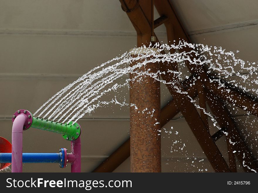 Water fountain at the swimming pool