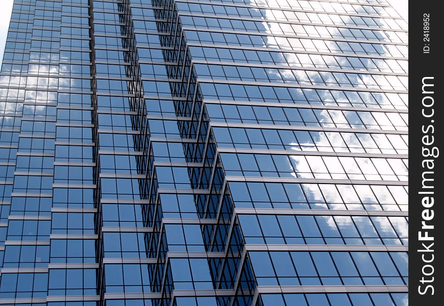 Beautiful reflections of the clouds in the glass bulidings of downtown Dallas. Beautiful reflections of the clouds in the glass bulidings of downtown Dallas