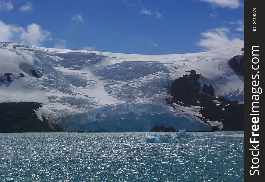 Huge glacier flowing into the sea in antarctica