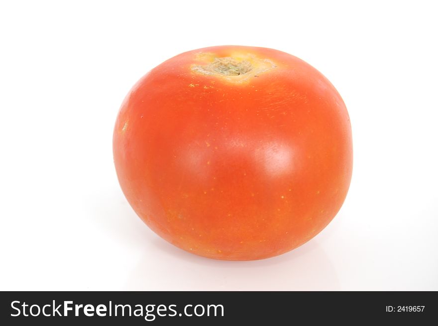 Some healthy red tomatoes on a white back drop setting. Some healthy red tomatoes on a white back drop setting.