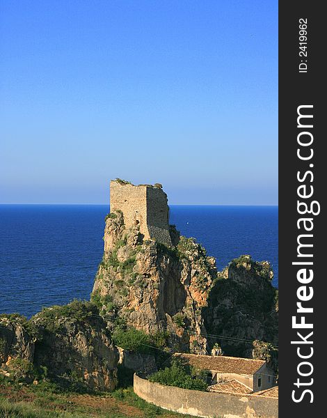 Amcient Normand tower construction and sea vpanrama. Architecture, history. sicliy, Italia. Amcient Normand tower construction and sea vpanrama. Architecture, history. sicliy, Italia.