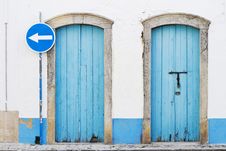 Two Blue Doors And Blue Traffic Sign Royalty Free Stock Image Two Blue Doors And Blue Traffic Sign Royalty Free Stock Image