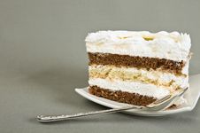 Cake Lies On A Saucer And Tea Spoon Stock Photography Cake Lies On A Saucer And Tea Spoon Stock Photography