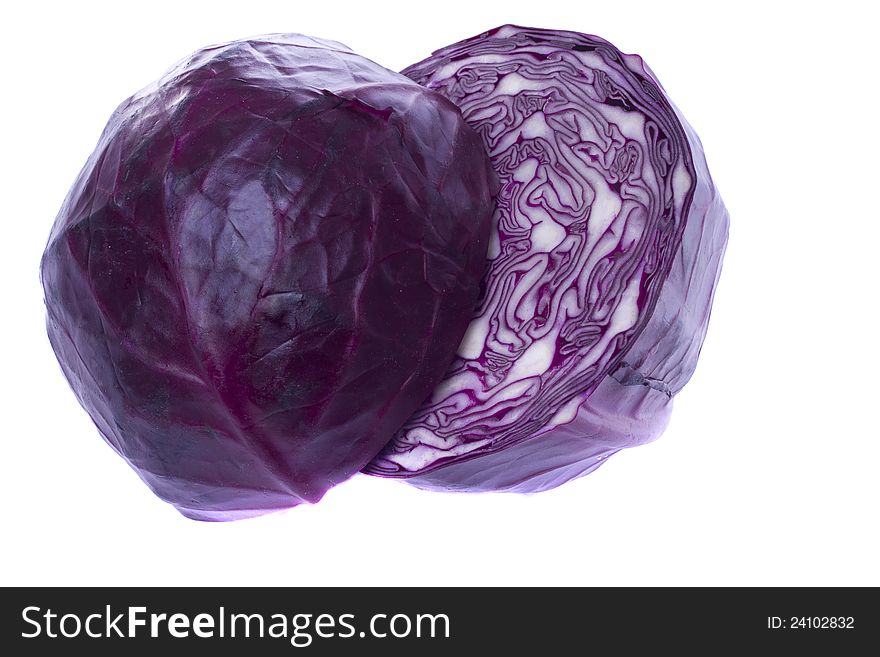 Close view of a sliced red cabbage isolated on a white background.