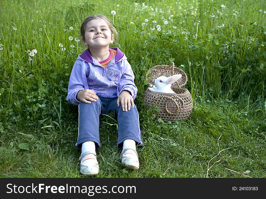 Adorable Little girl smiling with  white rabbit. Adorable Little girl smiling with  white rabbit