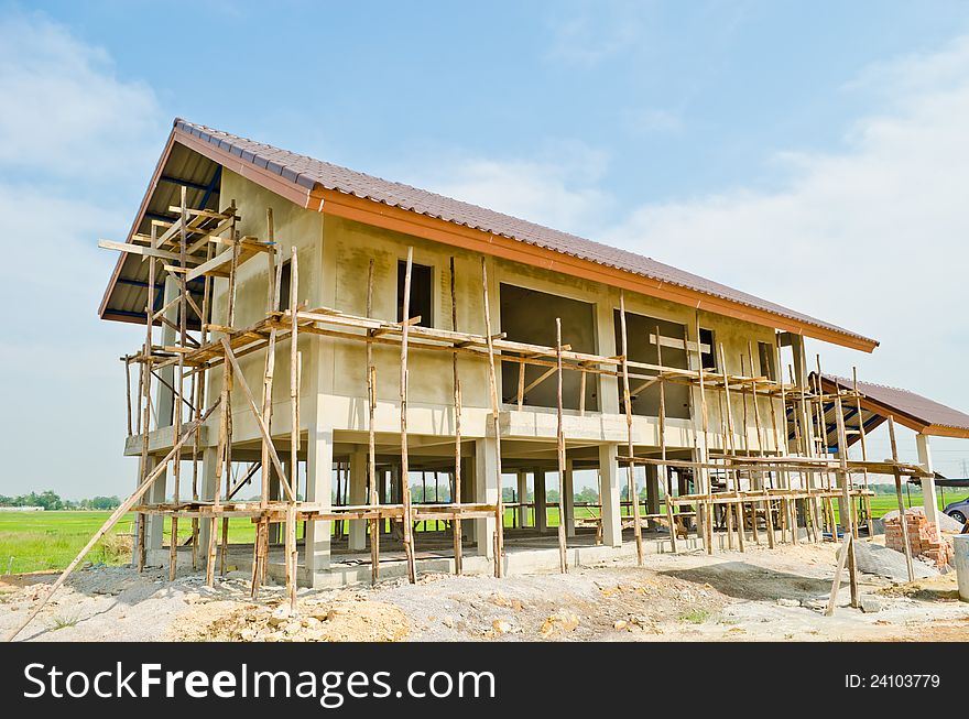 A new home under construction with sky background