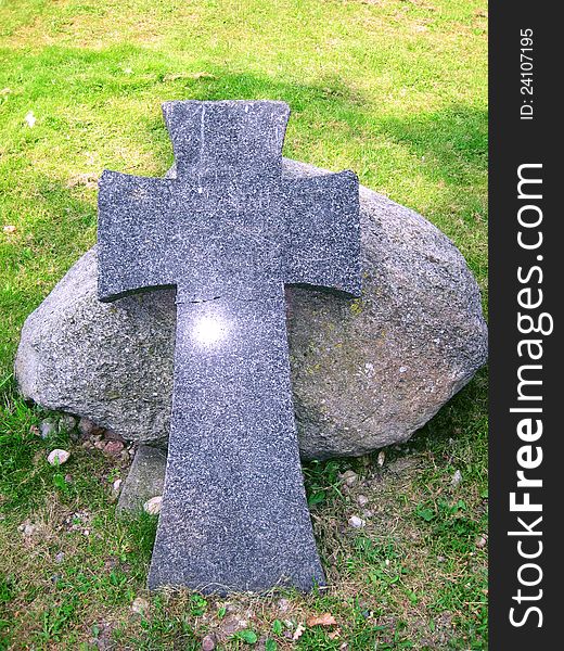 Stone cross and a large stone