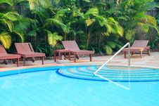 Wooden Pool Trestle Beds By The Poolside Royalty Free Stock Images