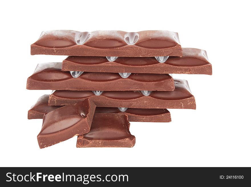 Chocolate pieces isolated on a white background