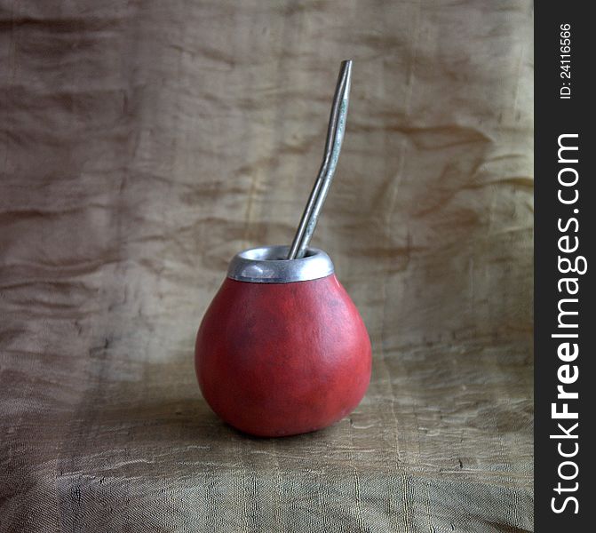 Crimson calabash on a silk background