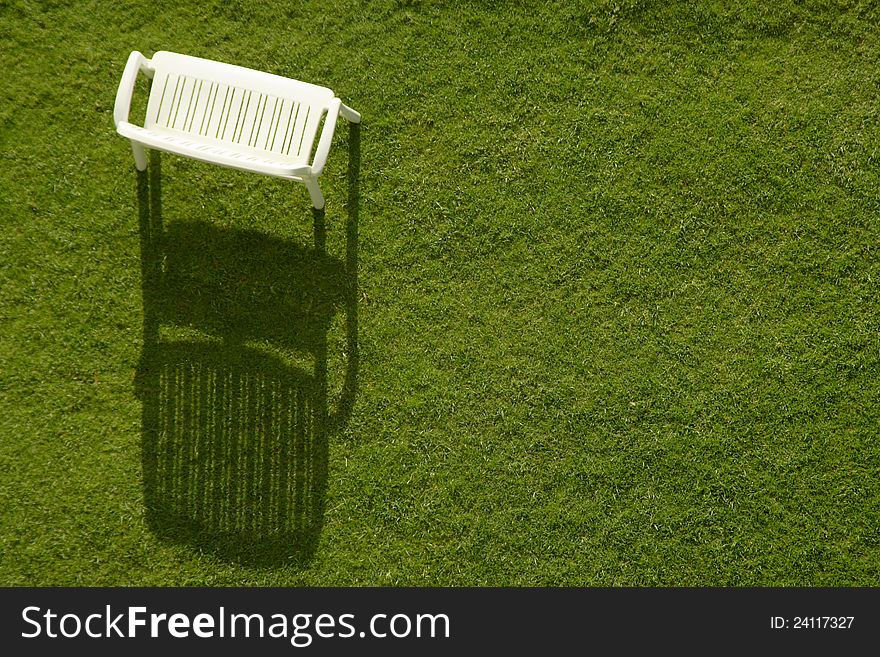 Chairs set out in the lawn at evening