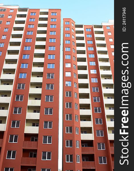 Rows of Apartment with Blue Sky in Background. Rows of Apartment with Blue Sky in Background
