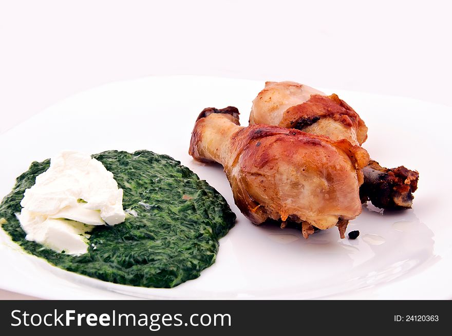 Spanach and chicken meal isolated. Spanach and chicken meal isolated