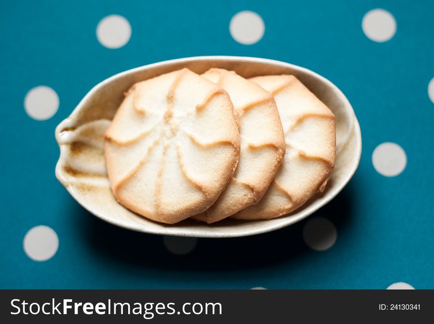 Plate of cookies on green polka dot