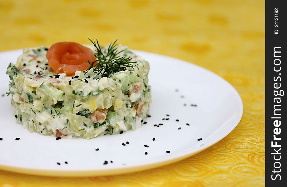A portion of the original salad with smoked salmon, vegetables and mayonnaise. A portion of the original salad with smoked salmon, vegetables and mayonnaise