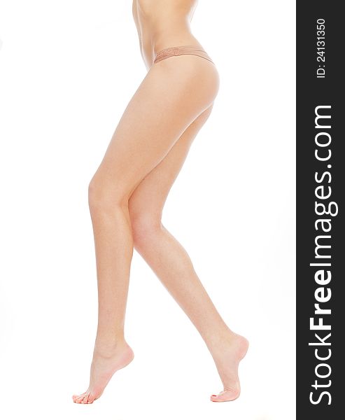 Beautiful Legs Girl In Panties On A White Backgrou
