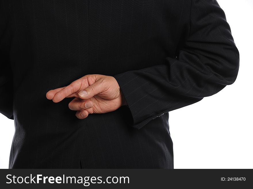 Businessman Crossing Fingers Behind His Back isolated on a white background