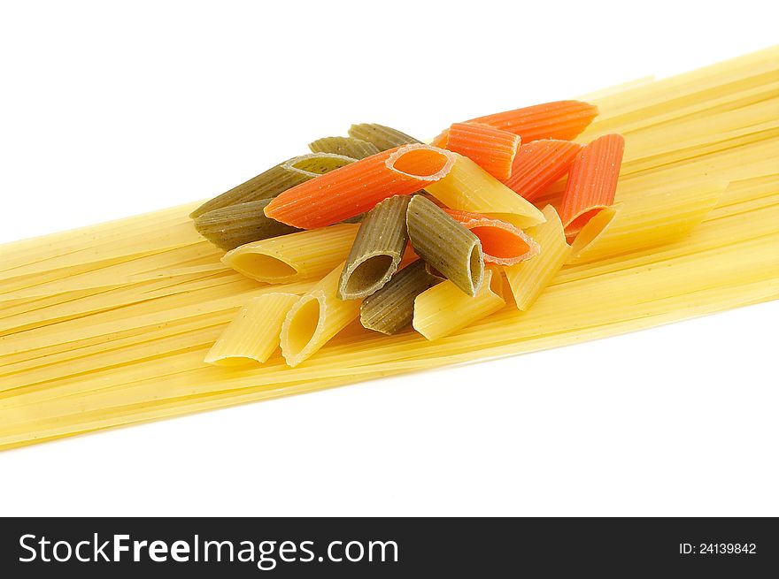 Italian pasta spaghetti and Penne rigate tricolore isolated on white background