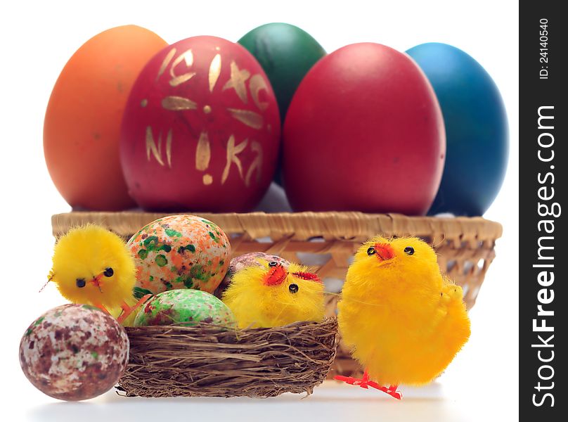 Easter eggs and decorations in a basket. selective focus on chicks. Easter eggs and decorations in a basket. selective focus on chicks