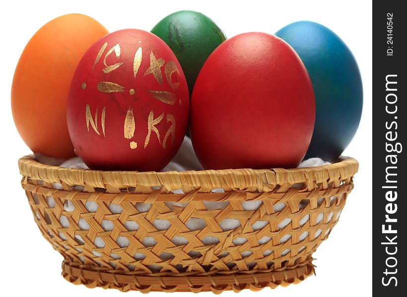Easter eggs and decorations in a basket.