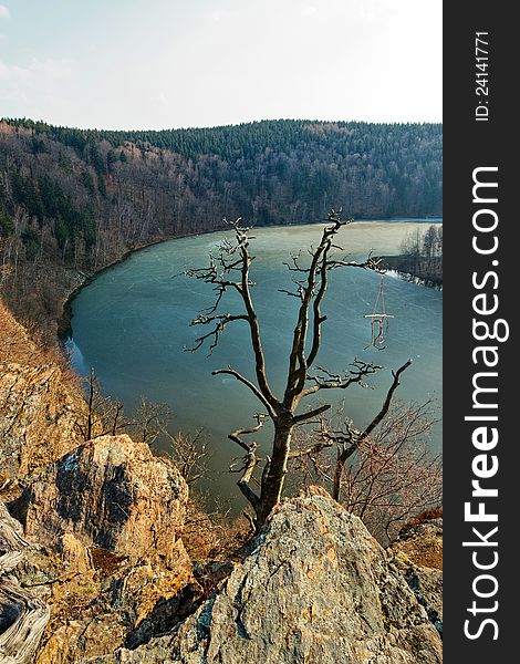 Sec dam with melting ice on surface, image taken from Oheb castle.