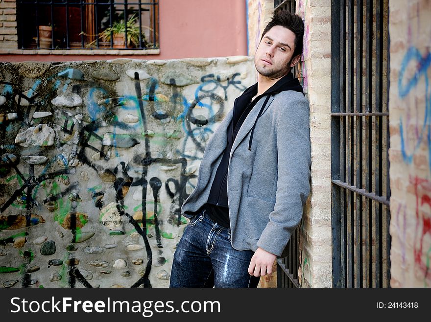 Portrait of handsome man in urban background. Portrait of handsome man in urban background