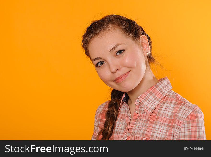 Close up portrait of young positive teenager girl
