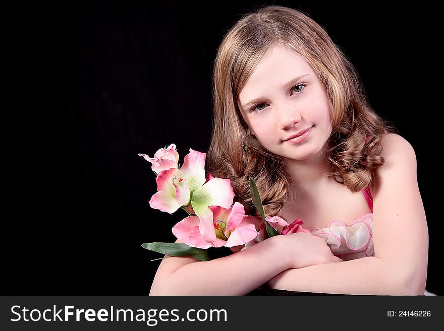 A pretty girl holding flowers