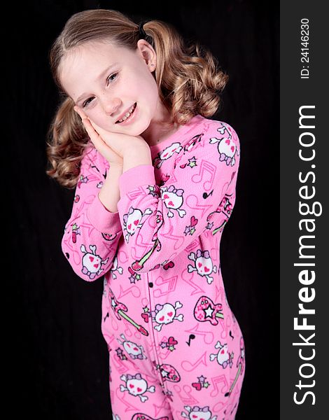 Little girl in pink pajamas. Little girl in pink pajamas