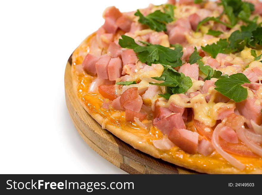 Pizza with ham closeup on white background