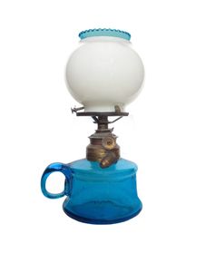 Antique Blue Glass Oil Lamp Isolated. Royalty Free Stock Photos