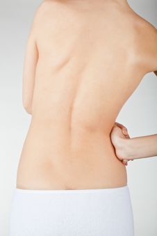 Woman Holding Her Painful Back Stock Image