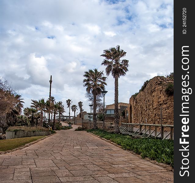 Ruins of the ancient Romanian harbor, Caesarea, Israel .