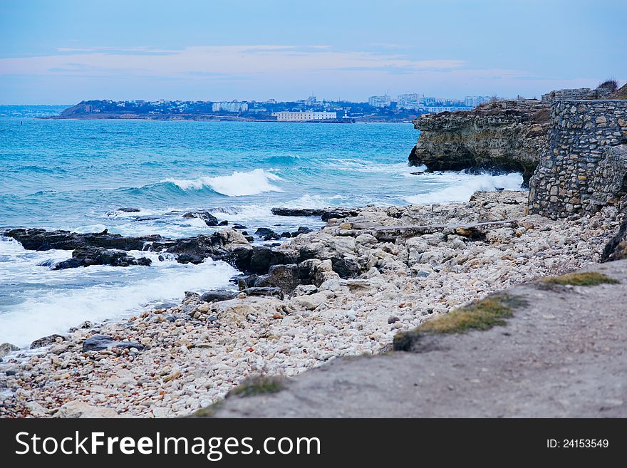 Landscape with the sea, waves and ruins of the ancient Khersones city in Crimea. Ukraine. Landscape with the sea, waves and ruins of the ancient Khersones city in Crimea. Ukraine