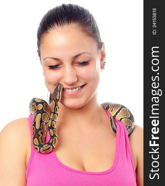 Cute smiling teenage girl playing with small pet python isolated on white. Cute smiling teenage girl playing with small pet python isolated on white.