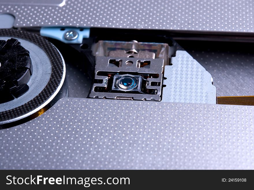 DVD Rom drive of laptop on white background