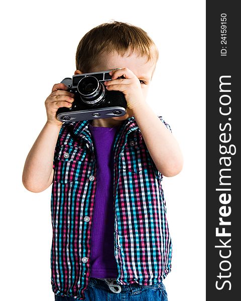 Cute child playing with retro analogue photo camera - isolated on white background. Cute child playing with retro analogue photo camera - isolated on white background