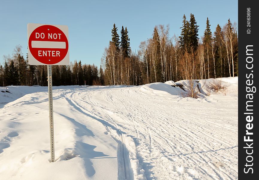 Do not enter sign on winter rural road in Alaska