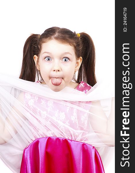 Little funny expressive girl with her tongue out, isolated on white background