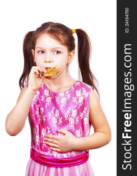 Portrait Of  Little Sweet Girl Eating Cookie