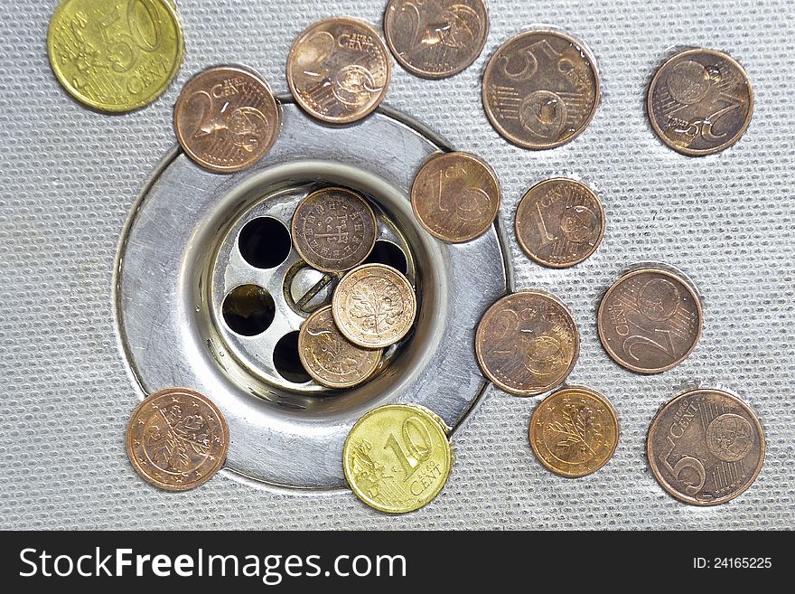 Coins close to drain