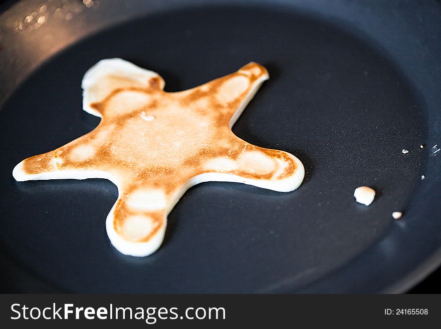 Smiles shaped cookies on pan