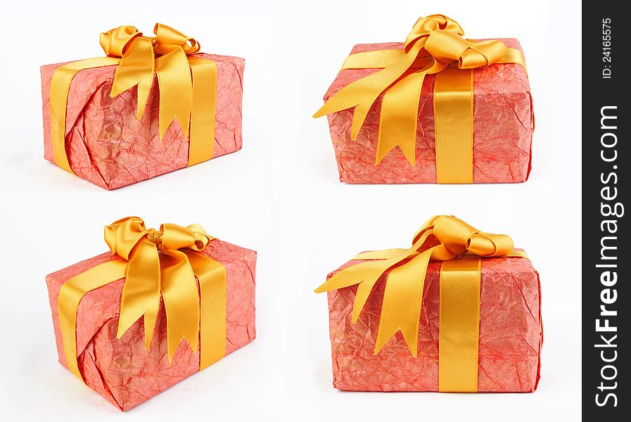 Single red gift box with yellow ribbon on white background