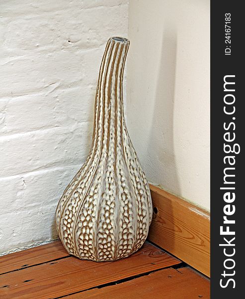 Photo of a modern organic shaped house ceramic ornament. Photo of a modern organic shaped house ceramic ornament.