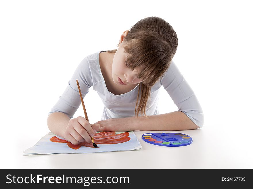 Image of a girl drawing color flower