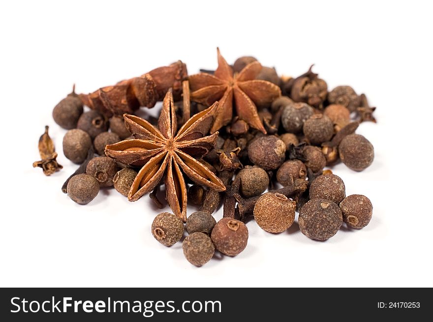 Spices : star anise , pepper and cloves  on white background