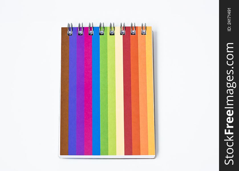 Notebook with colorful cover on background. Notebook with colorful cover on background